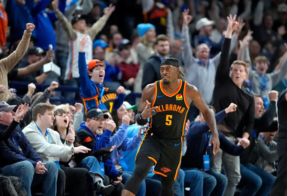 Oklahoma City's Luguentz Dort (5) celebrates a 3-point basket during second half of the NBA basketball game between the Oklahoma City Thunder and the Boston Celtics at the Paycom Center in Oklahoma City, Sunday, Jan., 5, 2025.