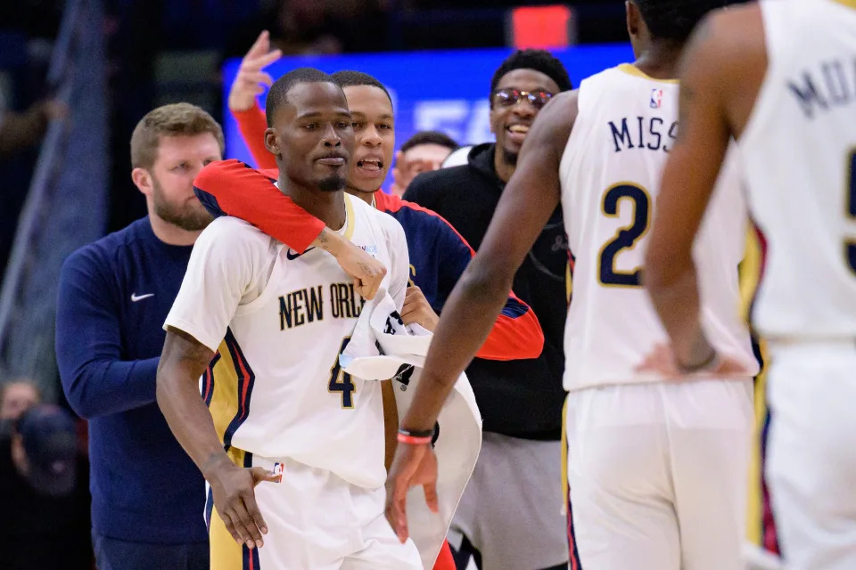 Pelicans guard Jordan Hawkins hugs guard Javonte Green (4) after he made a 3-pointer late in the fourth quarter against the Dallas Mavericks, Jan. 15, 2025, in New Orleans.