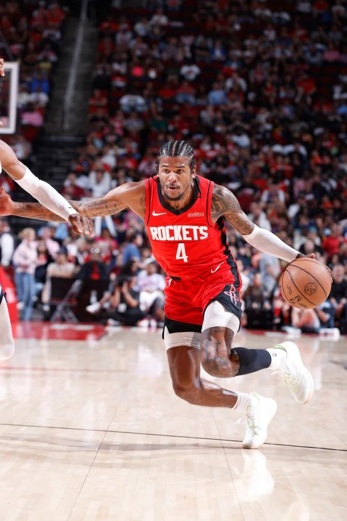 Jalen Green #4 of the Houston Rockets dribbles the ball during the game against the Denver Nuggets on April 13, 2025 at the Toyota Center in Houston, Texas. NBAE via Getty Images