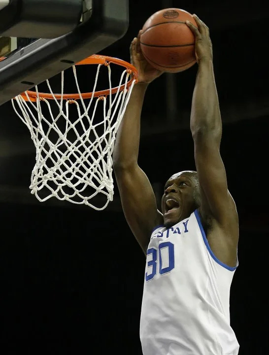 FILe – In this March 14, 2014 file photo, Kentucky forward Julius Randle (30) dunks the ball against LSU during the second half of an NCAA college basketball game in the quarterfinal round of the Southeastern Conference men’s tournament, in Atlanta. Randle will leave after one season to enter the NBA draft, where he is expected to be among the top five selections. With five days left before the deadline for underclassmen to declare, the 6-foot-9 Dallas native announced, Tuesday, April 22, 2014, the decision many expected even before he arrived as part of Kentucky’s best recruiting class ever. (AP Photo/Steve Helber, File)
