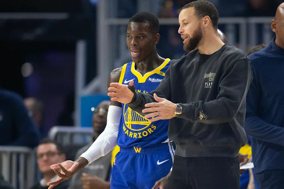 Jan 28, 2025; San Francisco, California, USA; Golden State Warriors guard Dennis Schröder (71) confers with Stephen Curry during the first quarter against the Utah Jazz at Chase Center. © D&period; Ross Cameron-Imagn Images