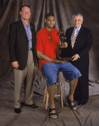 Tim Duncan holds his MVP Trophy