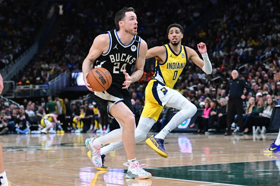 Pat Connaughton (24) drives for the basket against Indiana Pacers guard Tyrese Haliburton (0) in the NBA PlayoffsBenny Sieu-Imagn Images
