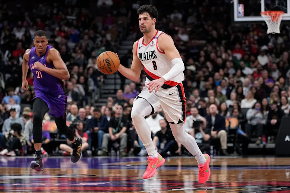 Portland Trail Blazers forward Deni Avdija (8) dribbles up court as Toronto Raptors center Orlando Robinson (21) defends.Mandatory Credit: John E. Sokolowski-Imagn Images
