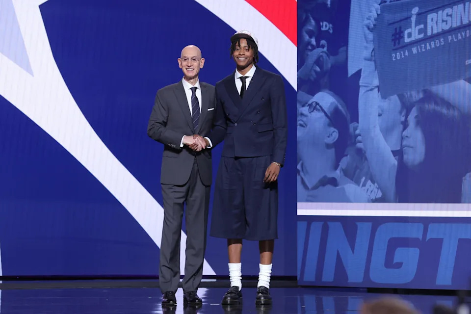 Tre Johnson stands with NBA commissioner Adam Silver after being selected as the sixth pick by the Washington Wizards.Brad Penner-Imagn Images