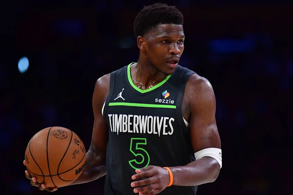 Minnesota Timberwolves guard Anthony Edwards (5) moves the ball against the Los Angeles Lakers during the first round of the 2025 NBA Playoffs at Crypto.com Arena.Gary A&period; Vasquez-Imagn Images