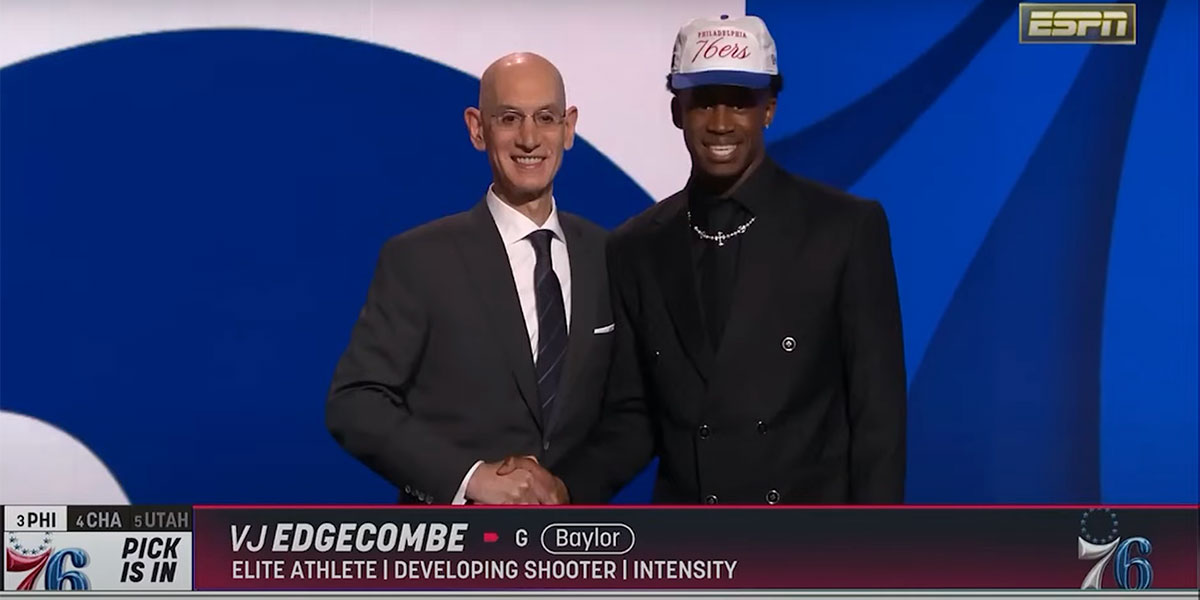 VJ Edgecombe shakes hands with NBA Commissioner Adam Silver after being drafted