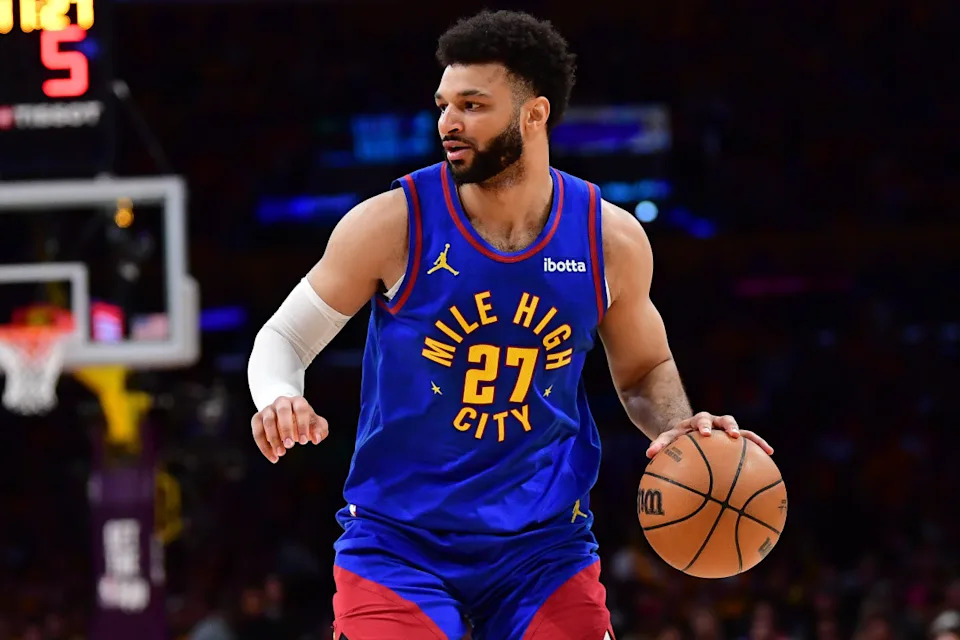 Denver Nuggets guard Jamal Murray (27) moves the ball against the Los Angeles Lakers during the first half in game three of the first round for the 2024 NBA playoffs at Crypto.com Arena. © Gary A. Vasquez-USA TODAY Sports