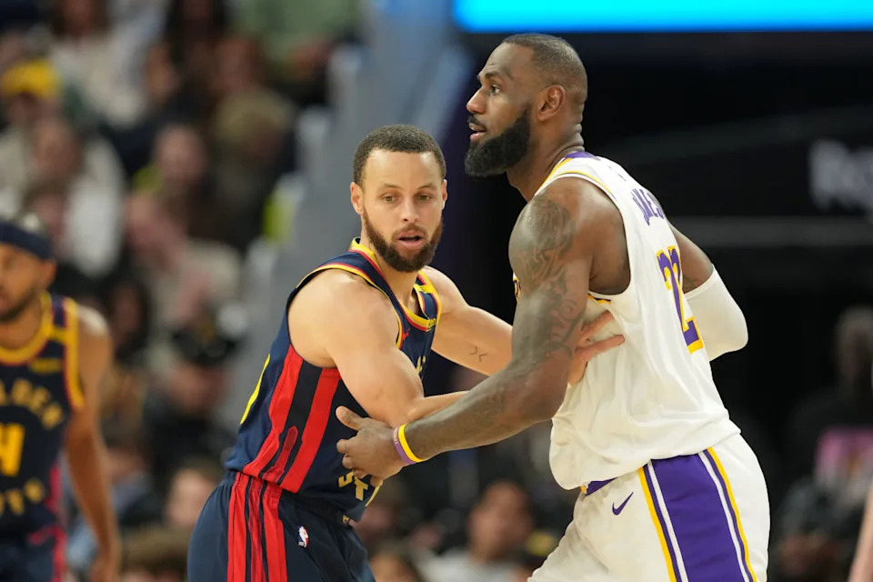 Golden State Warriors' Stephen Curry defends against Los Angeles Lakers' LeBron James at Chase Center.Darren Yamashita-Imagn Images