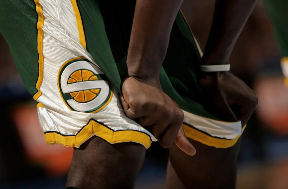 DENVER - MARCH 16: A member of the Seattle SuperSonics awaits action against the Denver Nuggets at the Pepsi Center on March 16, 2008 in Denver, Colorado. The Nuggets defeated the Sonics 168-116. NOTE TO USER: User expressly acknowledges and agrees that, by downloading and or using this photograph, user is consenting to the term and conditions of the Getty Images License Agreement. (Photo by Doug Pensinger/Getty Images)
