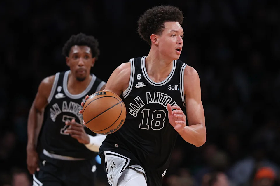 Jan 2, 2023; Brooklyn, New York, USA; San Antonio Spurs forward Isaiah Roby (18) dribbles up court during the second half against the Brooklyn Nets at Barclays Center. Mandatory Credit: Vincent Carchietta-USA TODAY Sports