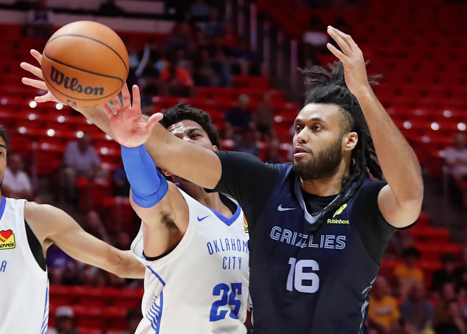 SALT LAKE CITY, UT - JULY 5 : Efton Reid III #16 of the Memphis Grizzlies grabs a reobund away from Ajay Mitchell #25 of the Oklahoma City Thunder during the first half of their NBA Summer League game at the Jon M. Huntsman Center on July 5, 2025 in Salt Lake City, Utah. NOTE TO USER: User expressly acknowledges and agrees that, by downloading and or using this photograph, User is consenting to the terms and conditions of the Getty Images License Agreement. (Photo by Chris Gardner/Getty Images)