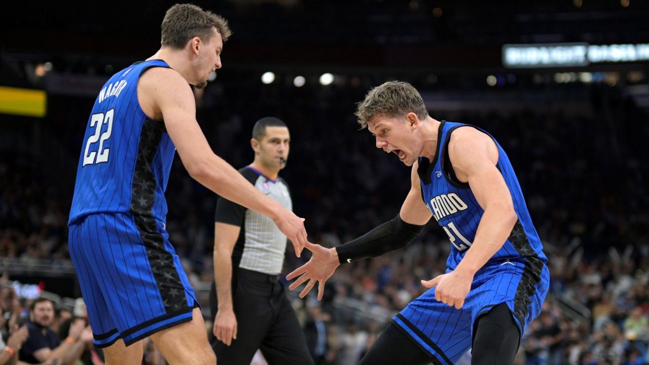 Franz (left) and Moe Wagner and the rest of the Orlando Magic will get to play a regular-season NBA game in the Wagners' hometown of Berlin in January. ((AP Photo/Phelan M. Ebenhack, file)