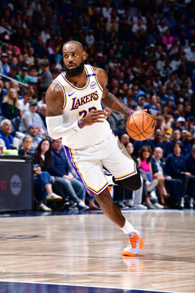 LeBron James dribbling the ball during an NBA Playoffs game.