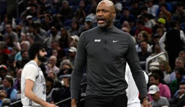 Orlando Magic head coach Jamahl Mosley calls out to an official during the first half of an NBA basketball game against the Toronto Raptors, Tuesday, March 4, 2025, in Orlando, Fla. (AP Photo/Phelan M. Ebenhack)