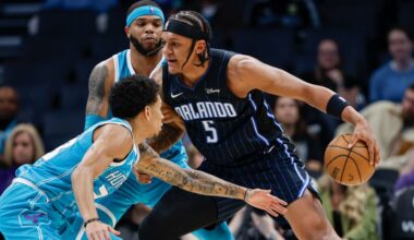 Paolo Banchero (right) and the rest of the Magic will begin their NBA Cup competition against Tre Mann (far left), Miles Bridges and the rest of the Hornets on Nov. 12 at Kia Center. (AP Photo/Nell Redmond)
