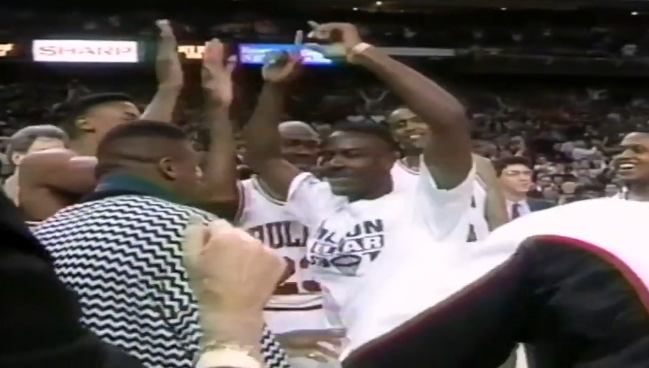 Calhoun celebrated with the Bulls and Jordan after making his historic shot