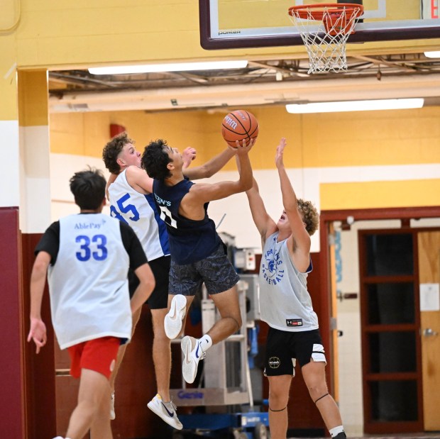 Salisbury's Steven Lozada shoots the ball under pressure as the team plays Southern Lehigh in the small school title game in the Lehigh Valley Summer Basketball League on Friday, July 25, 2025, at Whitehall High School. (Amy Shortell/The Morning Call)