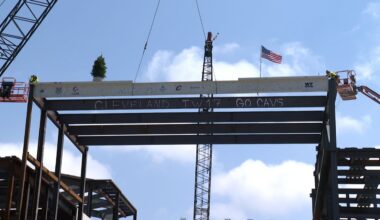 The workers putting the final steel beam on the infrastructure (Cierra Campbell)