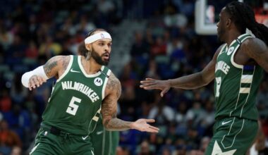 Milwaukee Bucks guard Gary Trent Jr. (5) celebrates after a basket with forward Taurean Prince (12) during the first half of an NBA basketball game against the New Orleans Pelicans in New Orleans, Sunday, April 6, 2025.