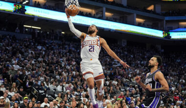Suns PG Tyus Jones goes up for the shot...