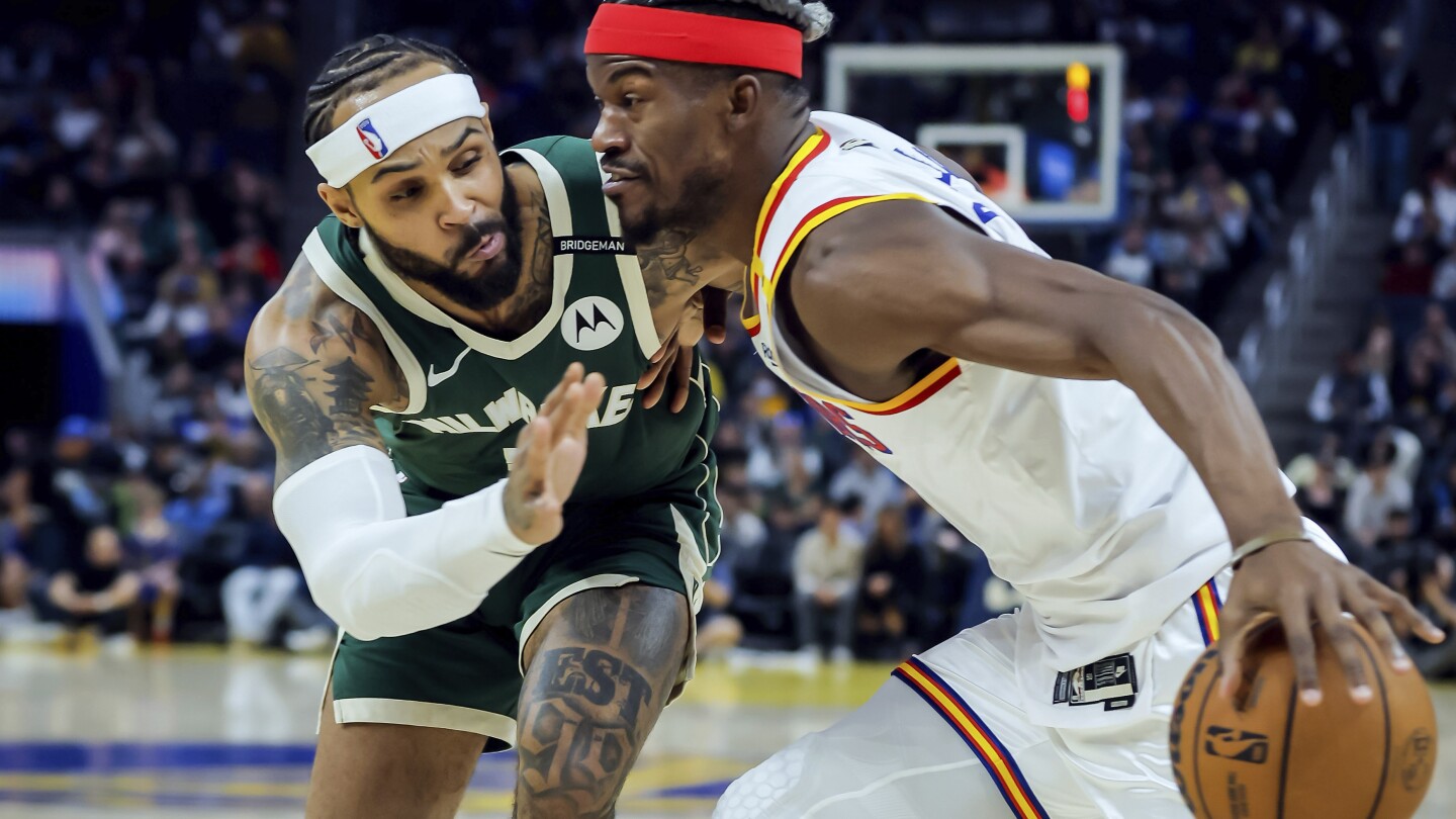 Butler scores 24 and Warriors win without Curry, 104-93 over Bucks