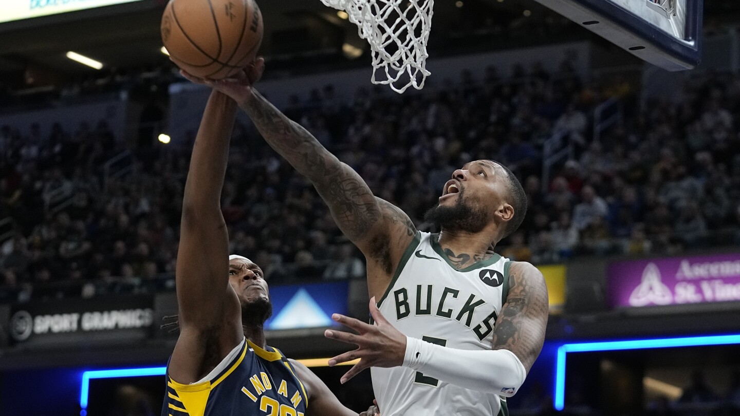 Turner agrees to join Bucks, who will waive Lillard, AP source says