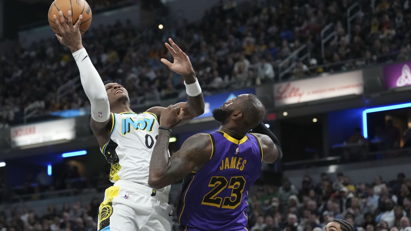 LeBron James has big finish to lift Lakers past Pacers and extend record scoring streak