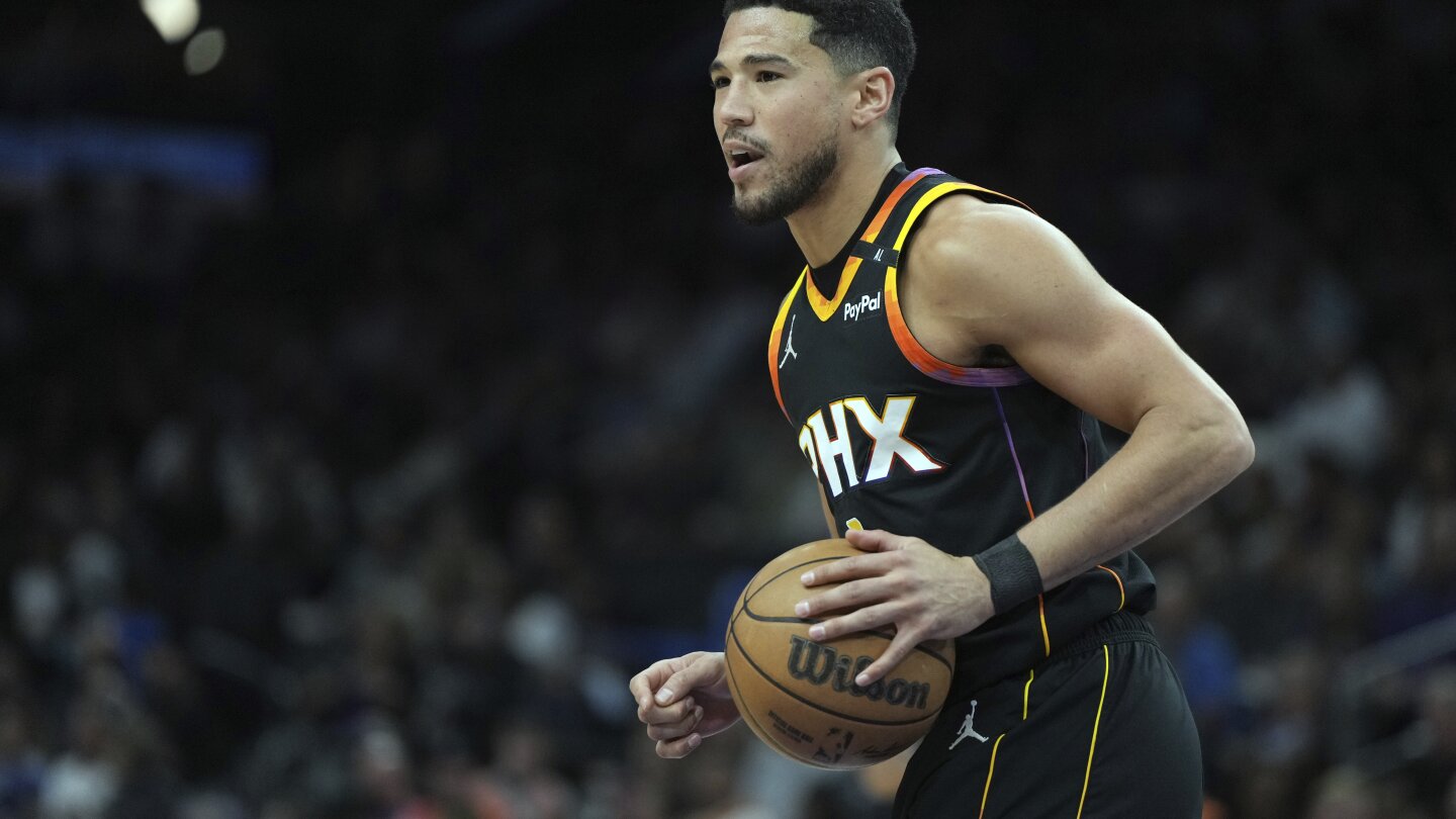 Suns sign Devin Booker to 2-year, $145 million max extension through 2029-30, AP sources say