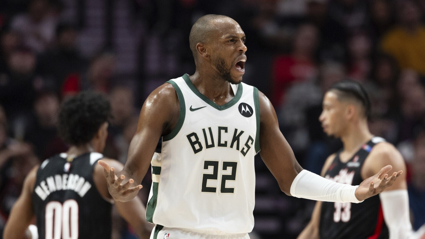 Bucks are adding Kyle Kuzma and sending Khris Middleton to the Wizards in a trade, AP source says