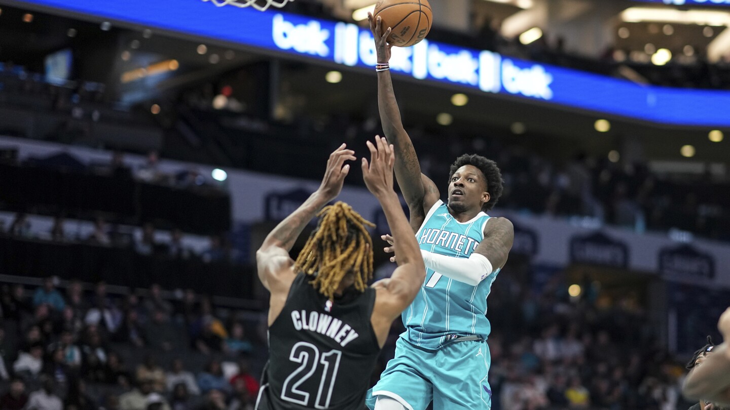 Hornets close with a 12-0 run to beat the Nets 105-102 and snap a nine-game losing streak