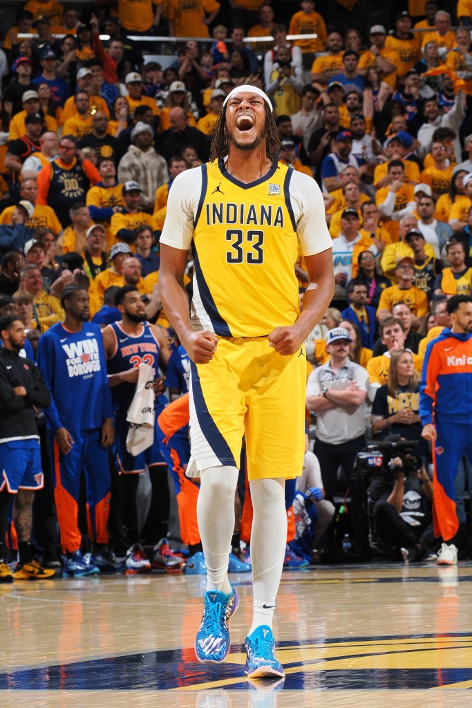 Myles Turner #33 of the Indiana Pacers celebrating during a game.