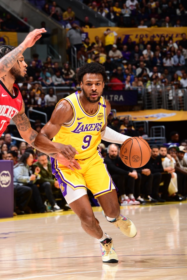 Bronny James #9 of the Los Angeles Lakers dribbling the ball during a basketball game.