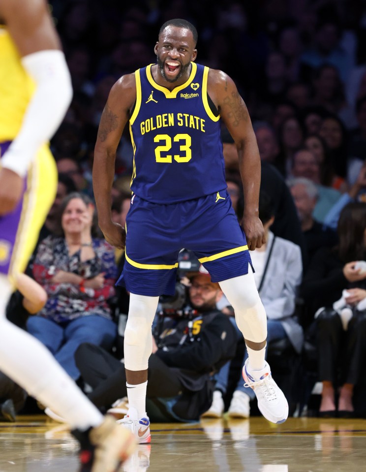 Draymond Green of the Golden State Warriors celebrating a three-pointer.