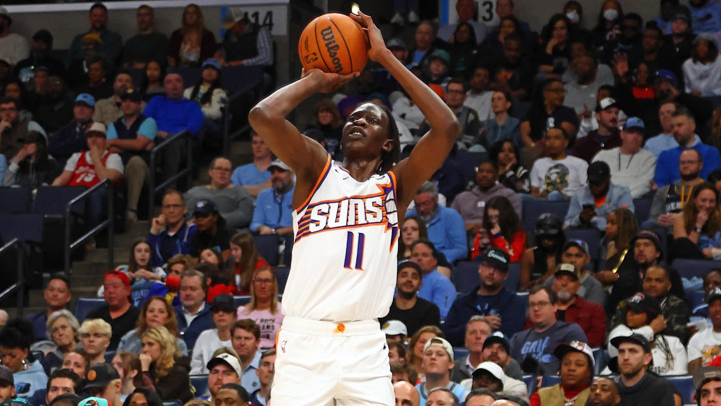 Feb 25, 2025; Memphis, Tennessee, USA; Phoenix Suns center Bol Bol (11) shoots for three during the third quarter against the Memphis Grizzlies at FedExForum. Mandatory Credit: Petre Thomas-Imagn Images