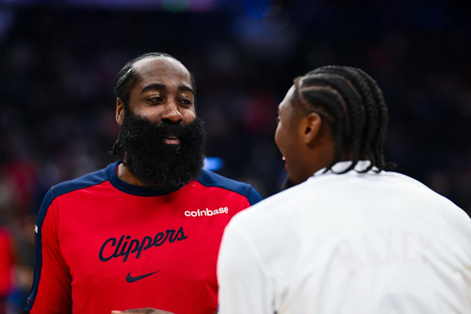 Nov 24, 2024; Philadelphia, Pennsylvania, USA; Los Angeles Clippers guard James Harden (1) reacts with Philadelphia 76ers guard Tyrese Maxey (0) before the game at Wells Fargo Center. Mandatory Credit: Kyle Ross-Imagn Images