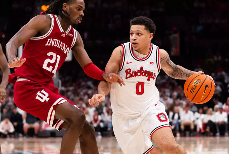 Ohio State guard John Mobley Jr. drives to the basket.