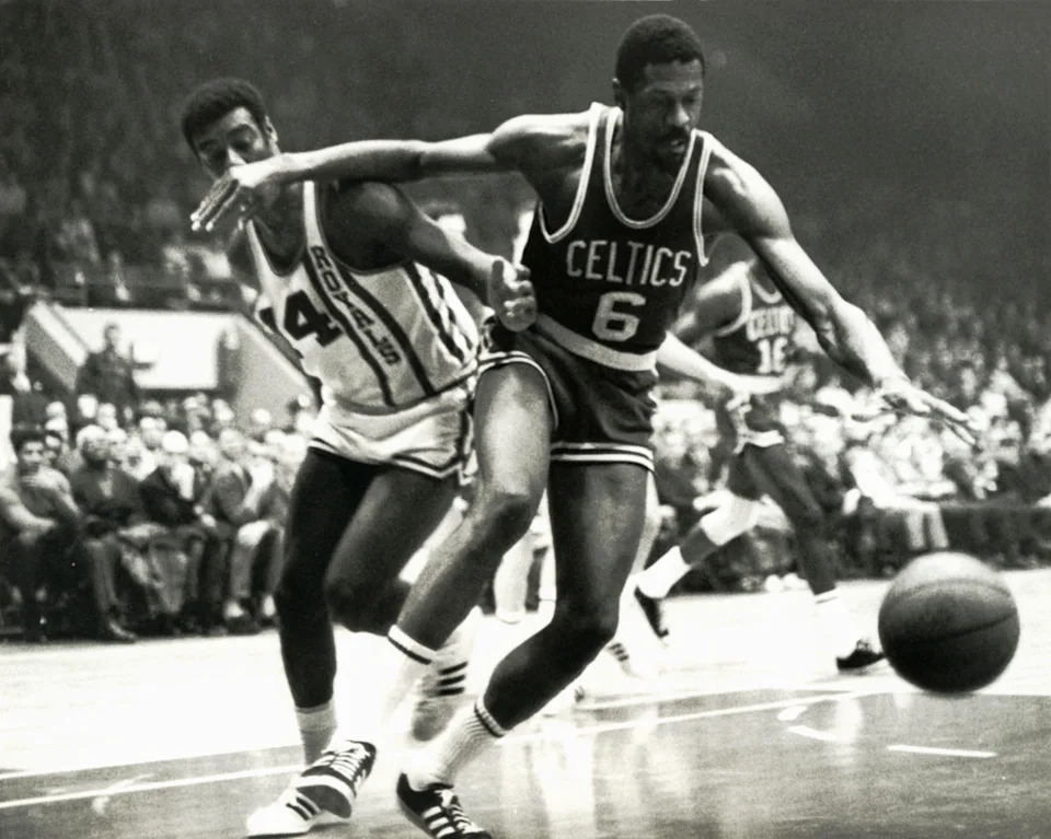 Unknown date; Cincinnati, OH, USA; FILE PHOTO; Boston Celtics center Bill Russell (6) fights for a loose ball against Cincinnati Royals guard Oscar Robertson (14) at Cincinnati Gardens. Mandatory Credit: Malcolm Emmons-USA TODAY Sports