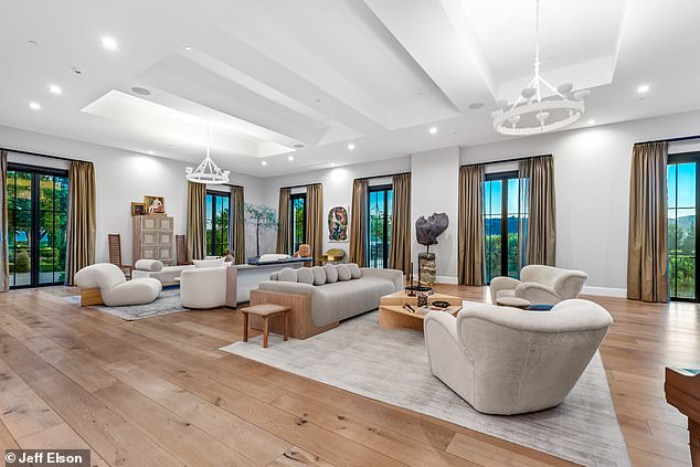 The 8-bed, 12-bath mansion has a state of art theater, a games room, wine cellar and gym
