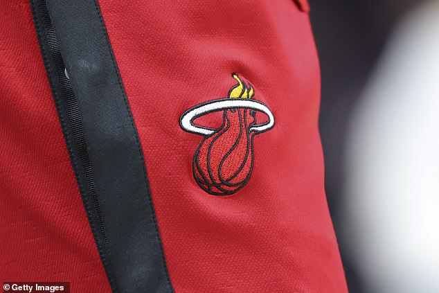 A former Miami Heat employee has been charged with selling stolen memorabilia