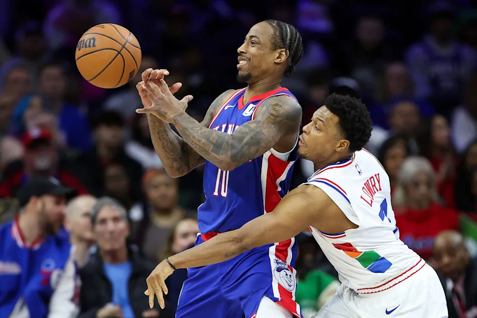 Jan 29, 2025; Philadelphia, Pennsylvania, USA; Philadelphia 76ers guard Kyle Lowry (7) knocks the ball from Sacramento Kings forward DeMar DeRozan (10) during the fourth quarter at Wells Fargo Center. Mandatory Credit: Bill Streicher-Imagn Images
