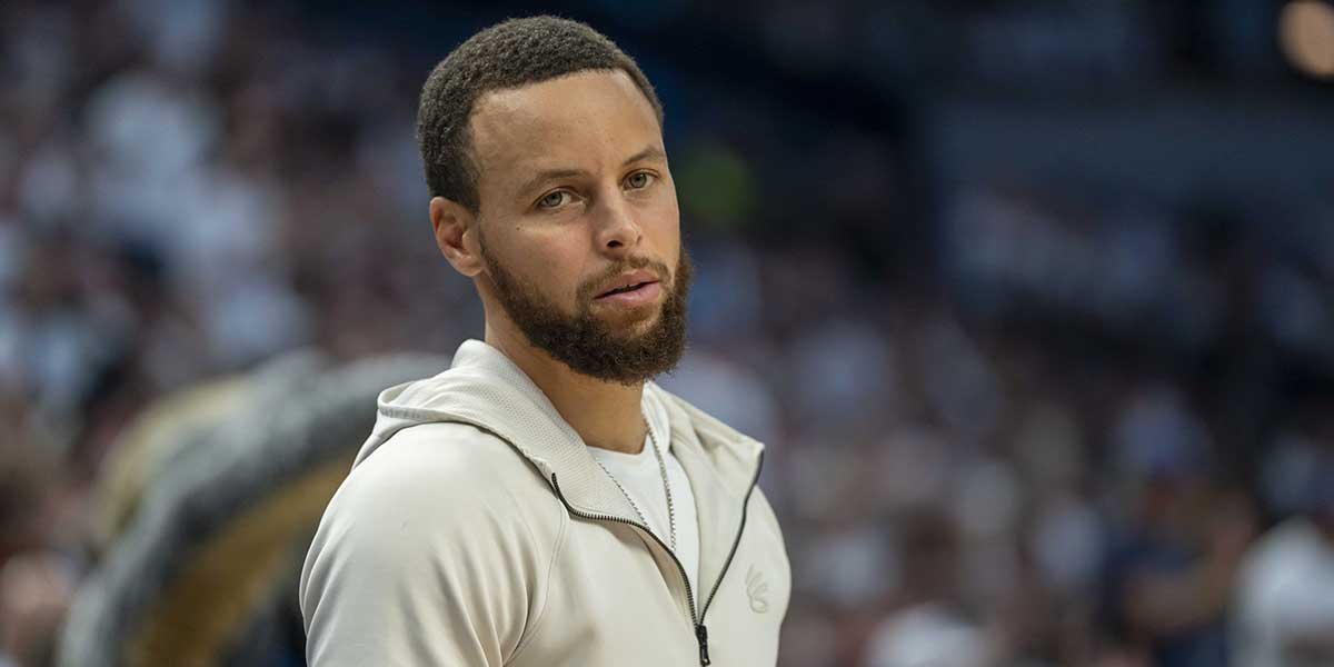 Warriors guard Stephen Curry (30) looks on against the Minnesota Timberwolves in the second half during game five of the second round for the 2025 NBA Playoffs at Target Center
