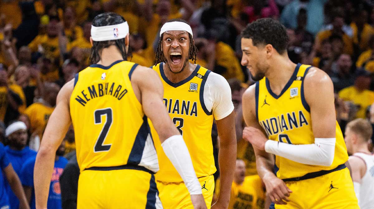Indiana Pacers center Myles Turner (33) reacts to guard Andrew Nembhard (2) celebrates his game clinching three-point basket during game three of the second round for the 2024 NBA playoffs against the New York Knicks at Gainbridge Fieldhouse.