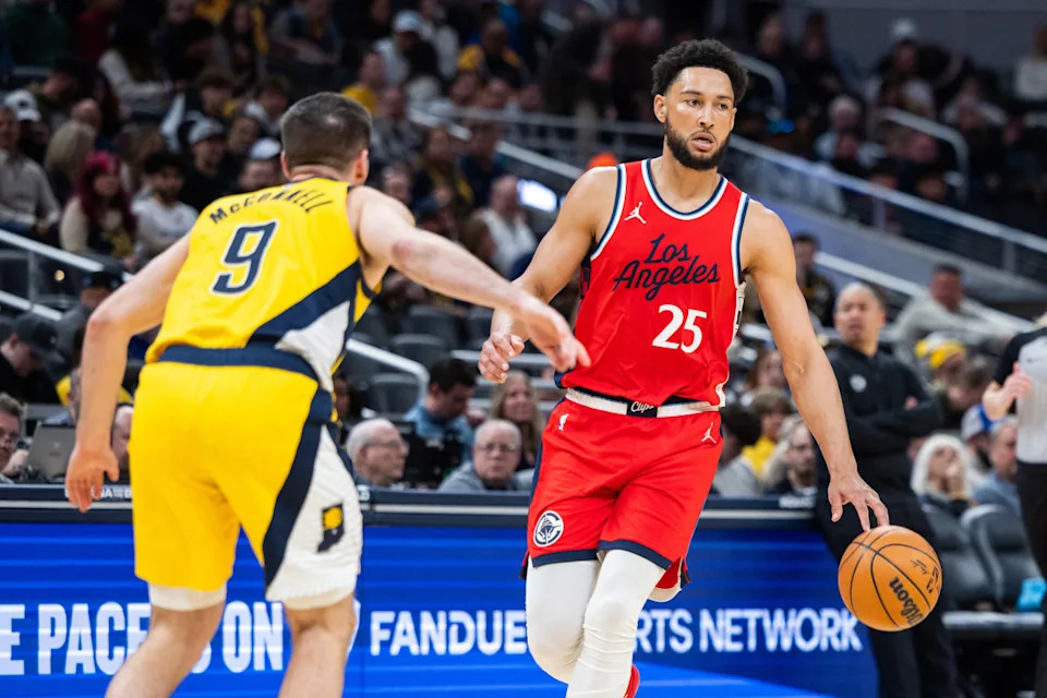 LA Clippers guard Ben Simmons (25) dribbles the ball while Indiana Pacers guard T.J. McConnell (9) © Trevor Ruszkowski-Imagn Images