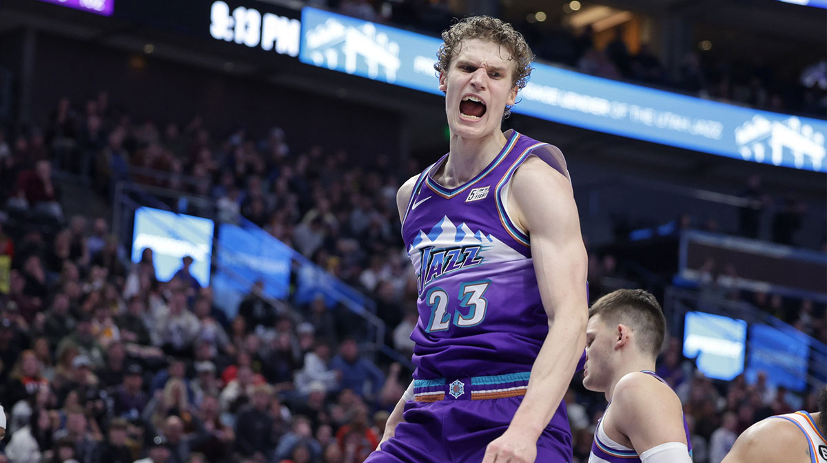 Utah Jazz forward Lauri Markkanen (23) reacts to dunking the ball during the second half against the Oklahoma City Thunder at Vivint Arena.