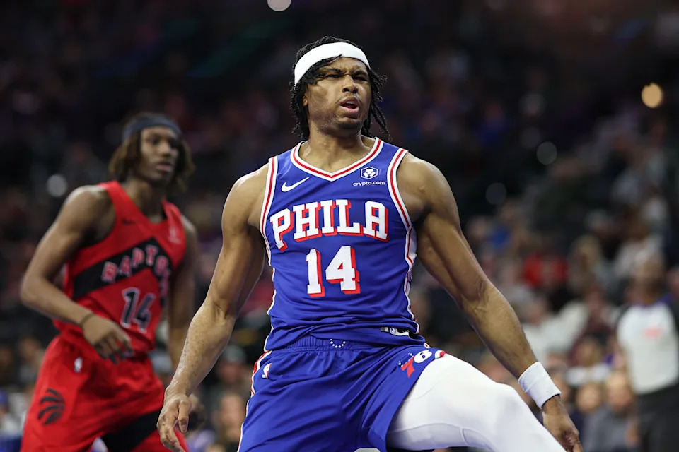 Mar 30, 2025; Philadelphia, Pennsylvania, USA; Philadelphia 76ers guard Ricky Council IV (14) reacts after dunking the ball against the Toronto Raptors during the second quarter at Wells Fargo Center. Mandatory Credit: Bill Streicher-Imagn Images