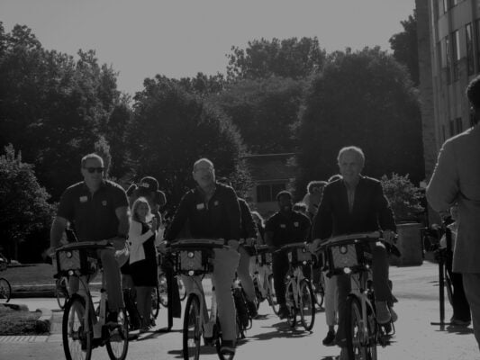 Members of Pacers Sports & Entertainment (PS&E), Butler University and community members take the inaugural Pacers x Butler Bikeshare program lap near Dugan Hall on the campus of Butler University on August 26, 2025 on the west side of Indianapolis, Indiana. (Photo/ Noral Parham)