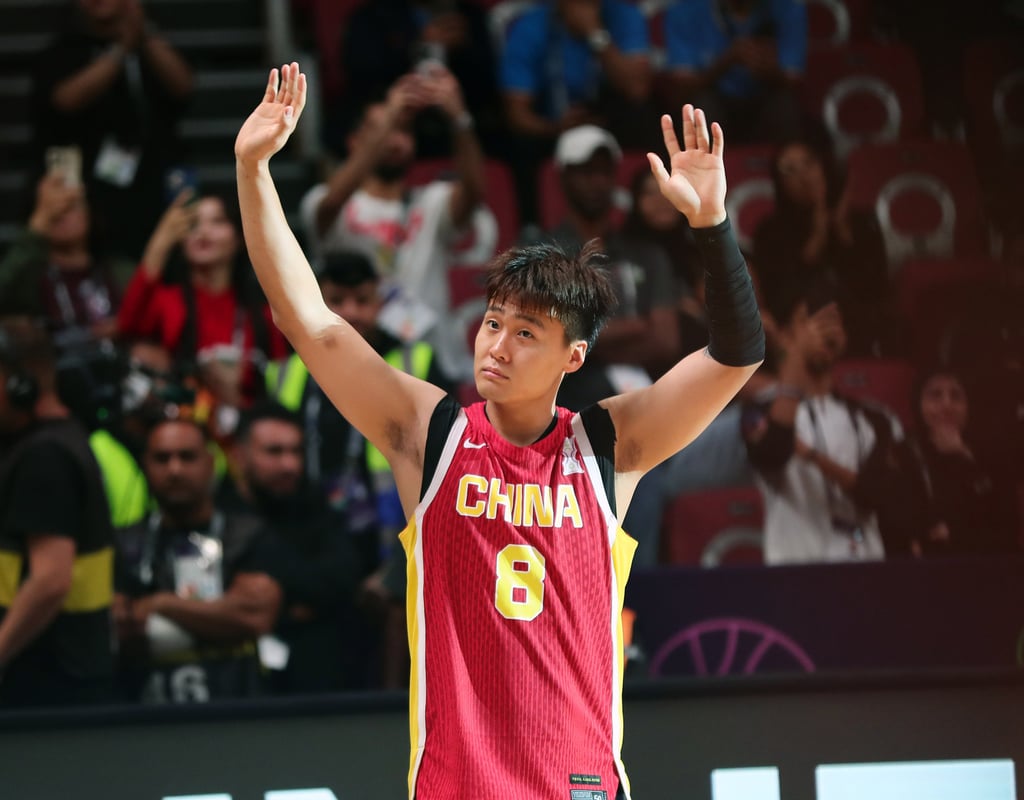 Zhao Rui acknowledges spectators after defeat in Sunday’s final. Photo: Xinhua