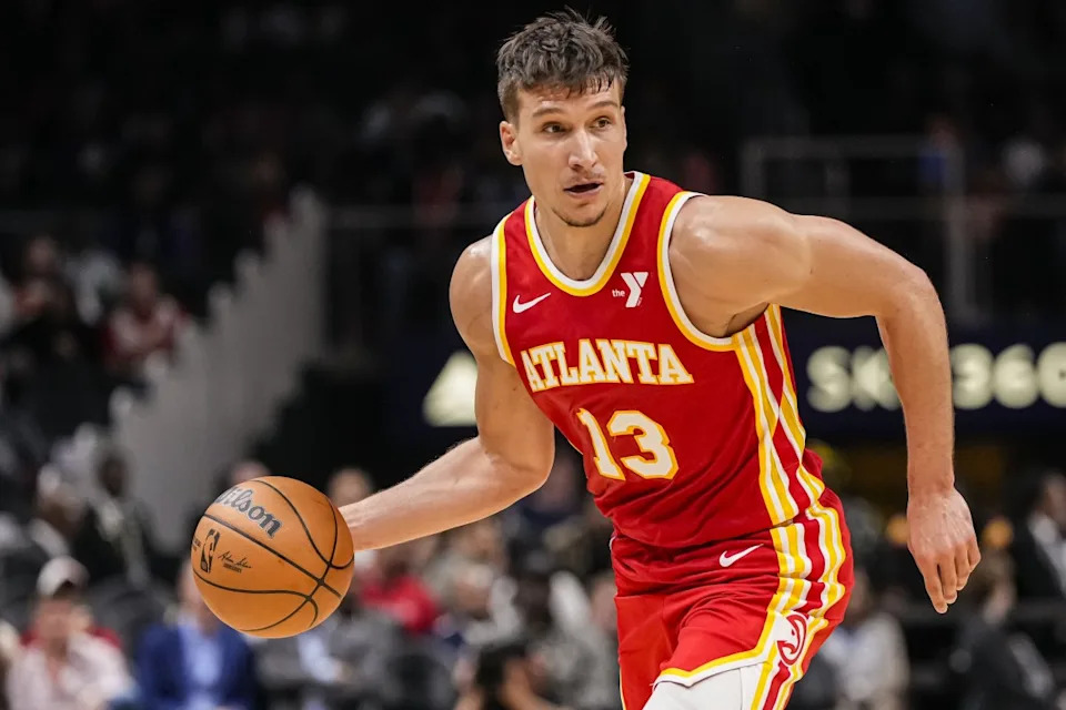 Atlanta Hawks guard Bogdan Bogdanović drives with the ball against the Charlotte Hornets at State Farm Arena on April 10, 2024.Dale Zanine-Imagn Images