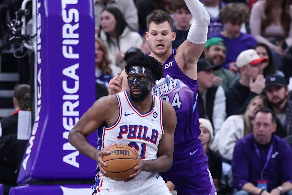 Dec 28, 2024; Salt Lake City, Utah, USA; Philadelphia 76ers center Joel Embiid (21) posts up against Utah Jazz center Walker Kessler (24) during the fourth quarter at Delta Center. Mandatory Credit: Rob Gray-Imagn Images